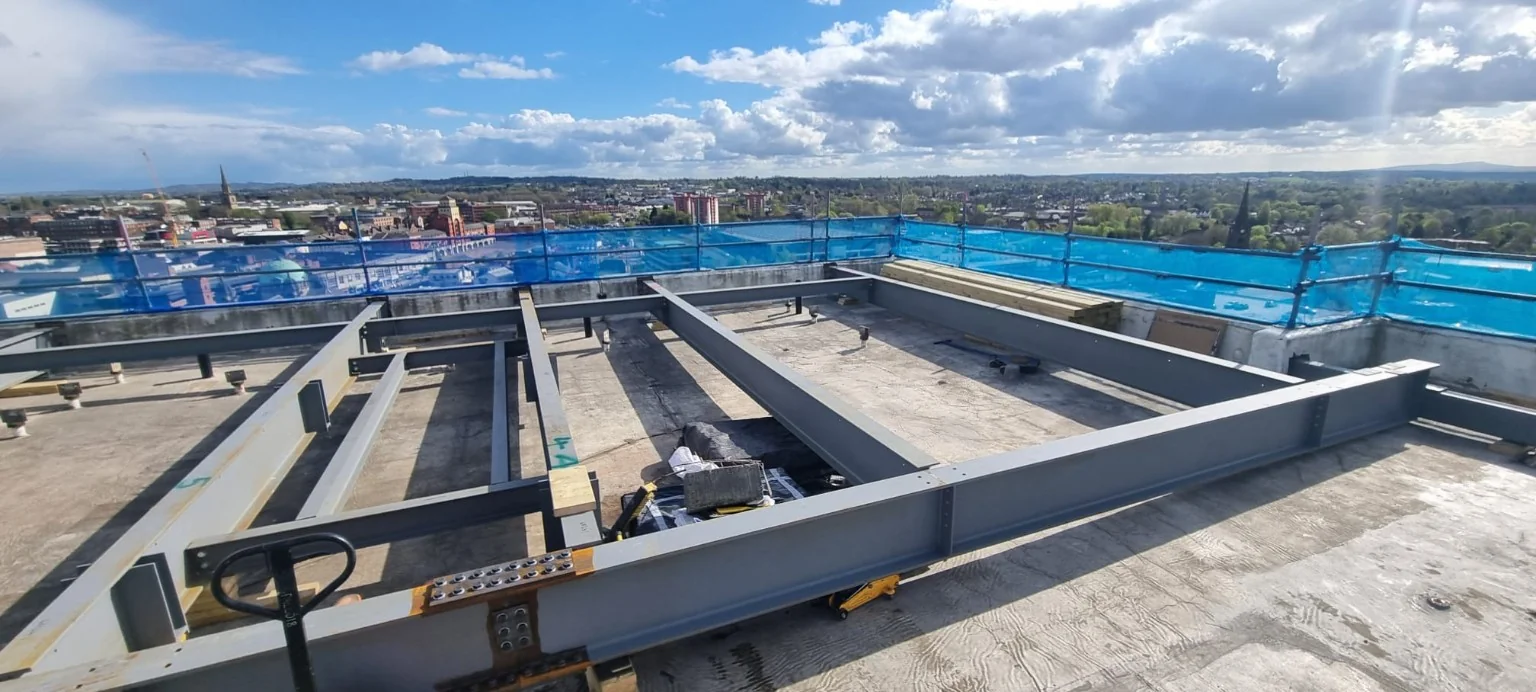 First structural steel sections of the rooftop extension
