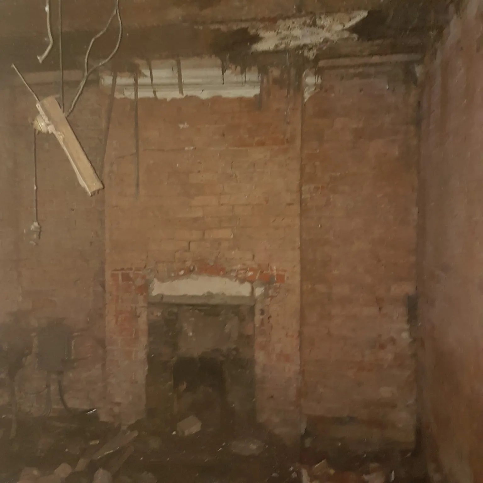 Exposed masonry during the initial strip-out