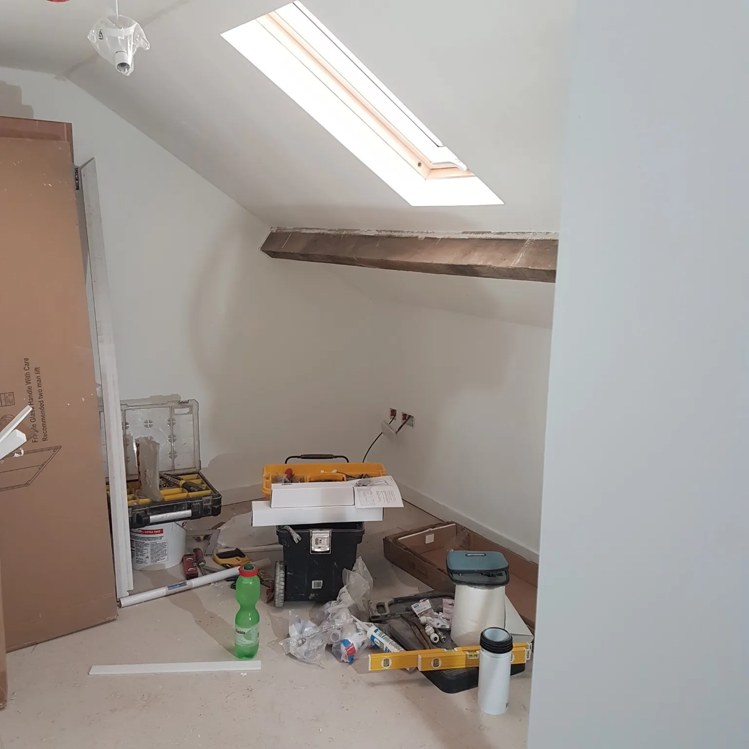 Renovated roof space with roof window during internal works