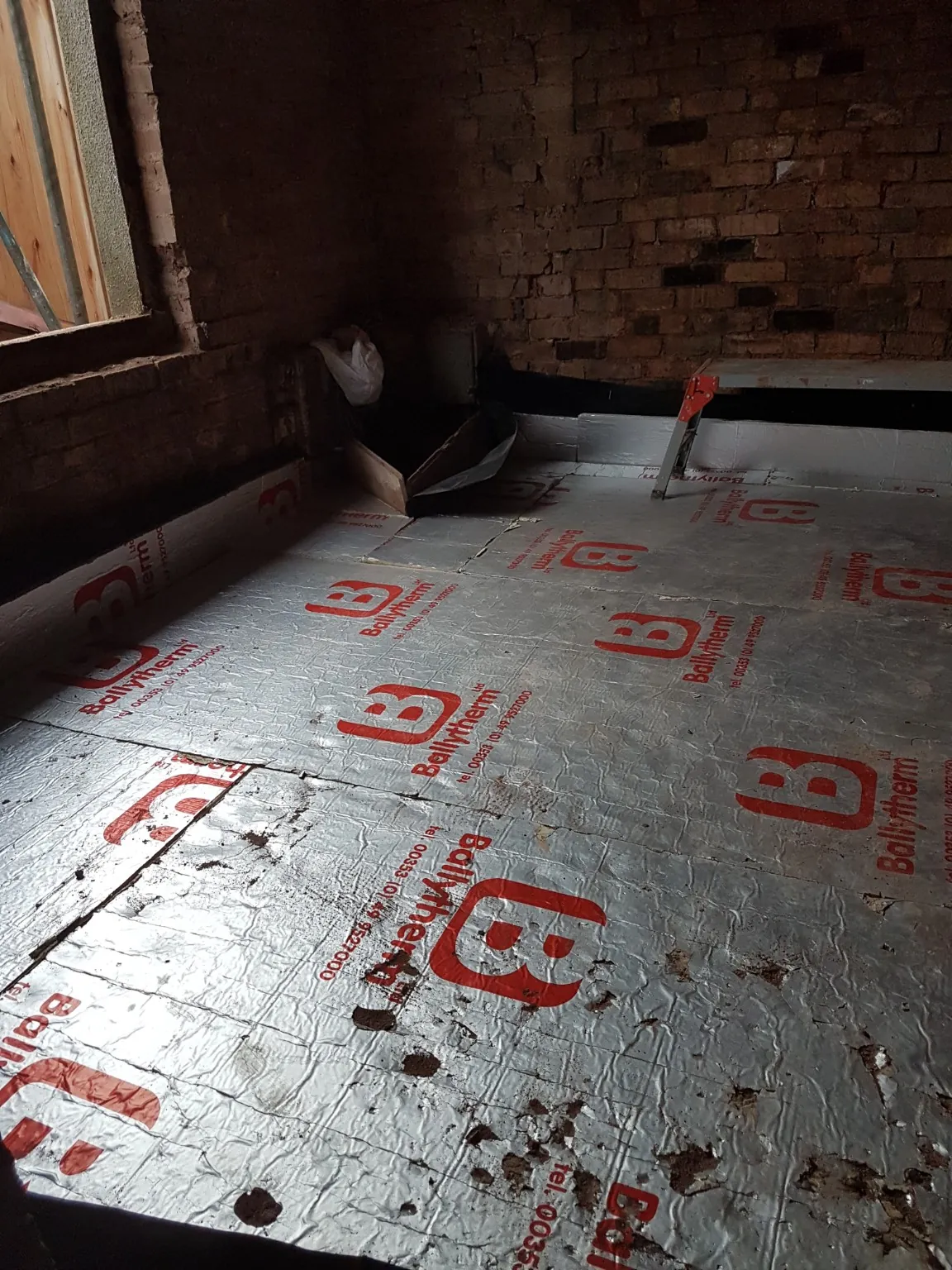 Thermal insulation boards laid over the floor