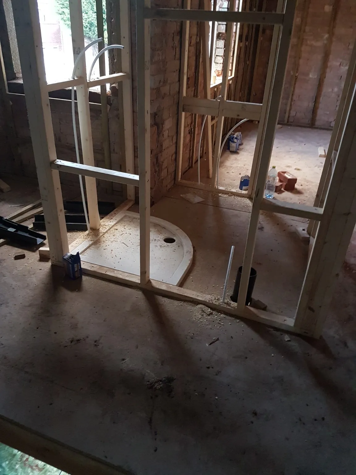 New internal stud partitions and shower tray installation